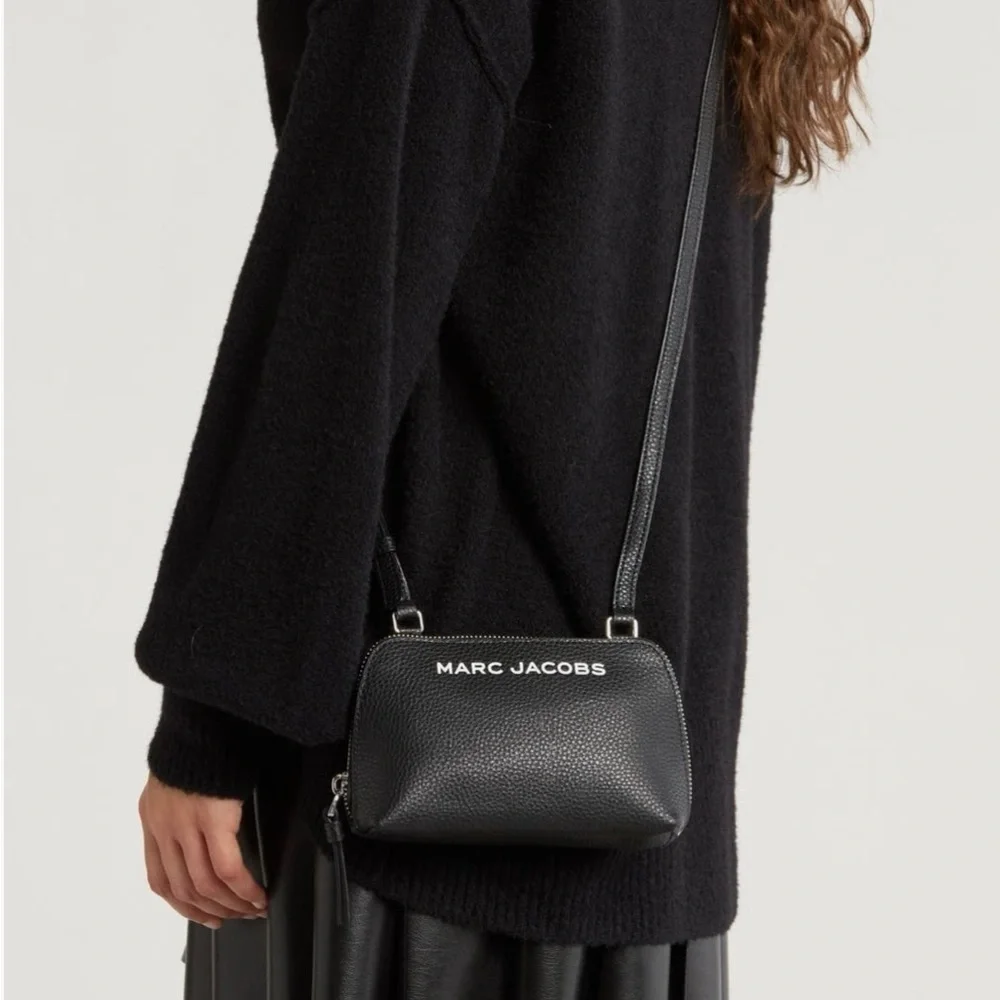 Marc Jacob’s small leather crossbody logo bag